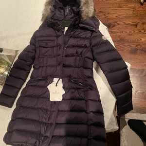Brand new MONCLER  in Navy with removable hood.